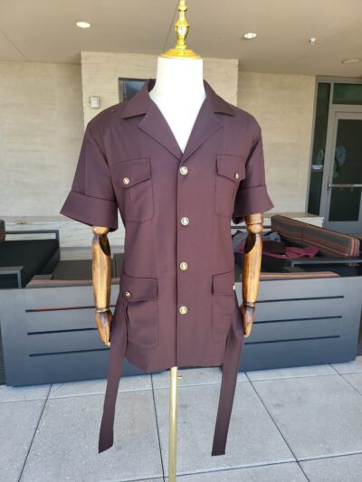 a two-piece burgandy safari suit made from vercelli italian fabric